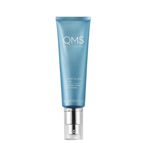 Crema facial de día con un toque de color de QMS.